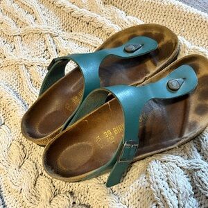 Teal Birkenstocks. 39